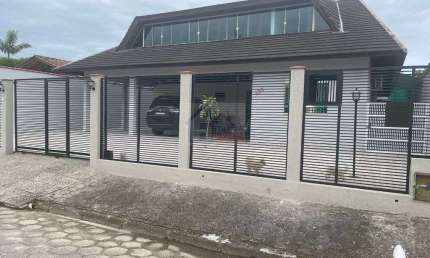 CASA 4 DORMITÓRIOS, PISCINA AQUECIDA, 3 VAGAS DE GARAGEM