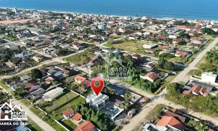 Sobrado com 4 quartos, 1 suíte, no balneário sai mirim, a 400m do mar.