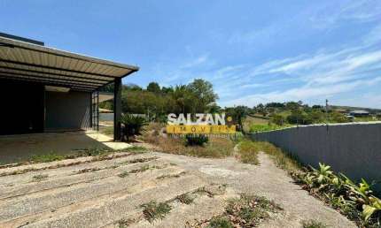 Casa com 3 dormitórios, 240 m² - venda por R$ 2.500.000,00 ou aluguel por R$ 6.900,00/mês - Chácaras Cataguá - Taubaté/SP