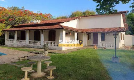 Casa com 5 dormitórios, 285 m² - venda por R$ 3.500.000,00 ou aluguel por R$ 7.500,00/mês - Chácaras Cataguá - Taubaté/SP