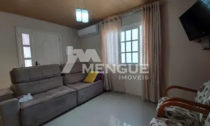 Casa com 3 quartos à venda na Acesso Vinte e Sete, 330, Alto Petrópolis, Porto Alegre por R$ 340.000