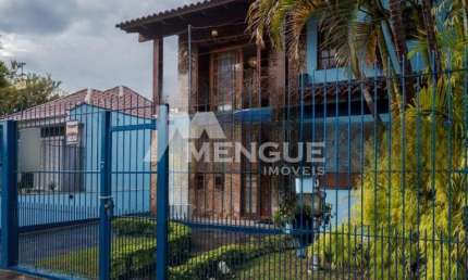 Casa com 4 quartos à venda na Rua Ararás, 344, Sarandi, Porto Alegre por R$ 1.200.000