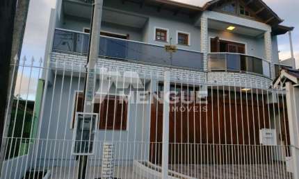 Casa com 3 quartos à venda na Rua Oscar Ferreira, 250, Rubem Berta, Porto Alegre por R$ 750.000