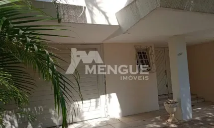 Casa com 3 quartos à venda na Rua Fontoura Xavier, 167, Jardim São Pedro, Porto Alegre por R$ 900.000