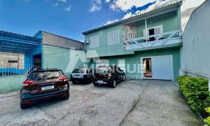 Casa com 5 quartos à venda na Rua Rodrigues da Costa, 34, Sarandi, Porto Alegre por R$ 950.000