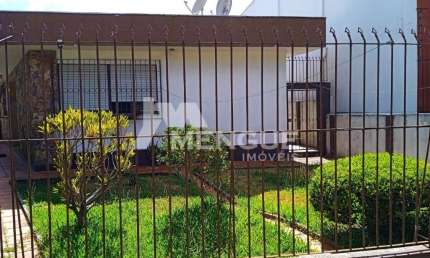 Casa com 4 quartos à venda na Rua Barão de Tramandaí, 15, Passo da Areia, Porto Alegre por R$ 1.075.000
