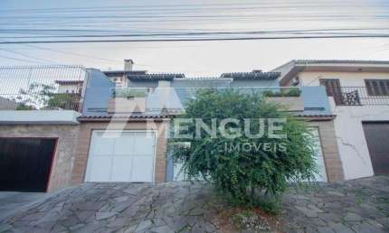 Casa com 3 quartos à venda na Rua Arnaldo Ballve, 705, Jardim Itu Sabará, Porto Alegre por R$ 600.000