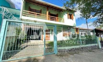 Casa com 4 quartos à venda na Avenida Salvador Leão, 648, Sarandi, Porto Alegre por R$ 850.000