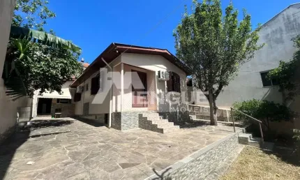 Casa com 3 quartos à venda na Rua Irmão Inocêncio Luís, 593, Jardim Itu Sabará, Porto Alegre por R$ 459.000