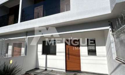 Casa com 3 quartos à venda na Alameda Três de Outubro, 251, Ecoville, Porto Alegre por R$ 649.000