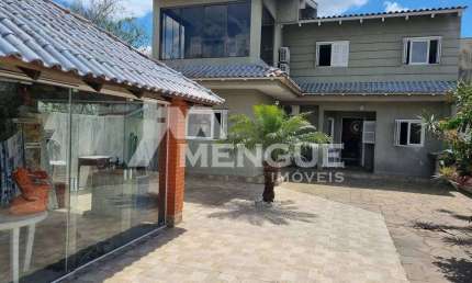 Casa com 3 quartos à venda na Rua Coronel João Pacheco de Freitas, 404, Jardim Itu Sabará, Porto Alegre por R$ 800.000