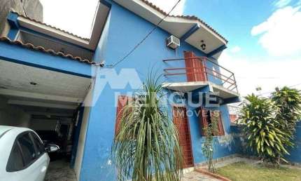 Casa com 3 quartos à venda na Avenida Toledo Piza, 401, Sarandi, Porto Alegre por R$ 480.000