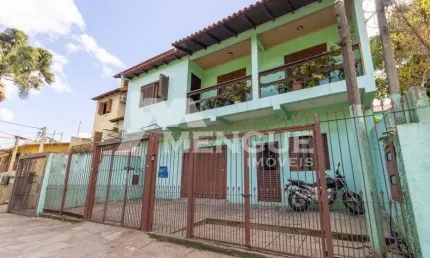 Casa com 3 quartos à venda na Rua Guadalajara, 115, Jardim Itu Sabará, Porto Alegre por R$ 750.000
