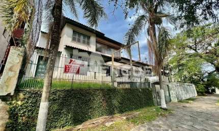 Casa com 3 quartos à venda na Avenida Quito, 415, Jardim Lindóia, Porto Alegre por R$ 1.500.000