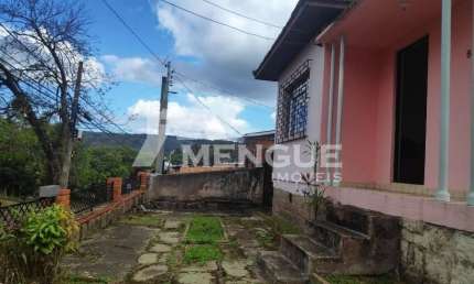 Casa com 2 quartos à venda na Beco Circular, 883, Jardim Itu Sabará, Porto Alegre por R$ 430.000