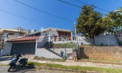 Casa com 3 quartos à venda na Rua Aluízio de Azevedo, 35, Jardim Itu Sabará, Porto Alegre por R$ 1.200.000