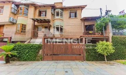 Casa com 3 quartos à venda na Rua Heitor Manganelli, 393, Jardim Itu Sabará, Porto Alegre por R$ 585.000