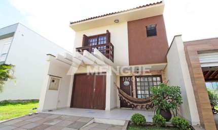 Casa em condomínio fechado com 3 quartos à venda na Rua Deputado Hugo Mardini, 1700, Passo das Pedras, Porto Alegre por R$ 878.000