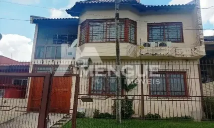 Casa com 3 quartos à venda na rua general telino chagastelles, 245, parque santa fé, porto alegre por r$ 1.200.000
