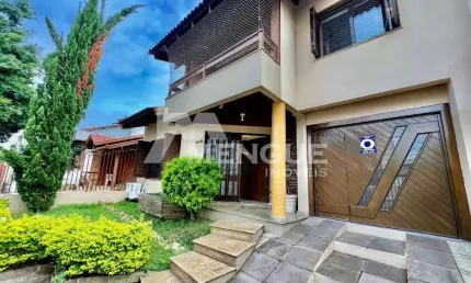 Casa com 4 quartos à venda na Rua Juruá, 105, Cristo Redentor, Porto Alegre por R$ 1.190.000