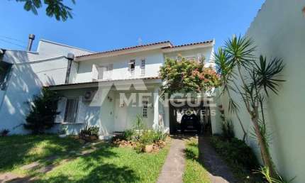 Casa com 3 quartos à venda na Rua Padre Henrique Lenz, 44, Jardim São Pedro, Porto Alegre por R$ 780.000