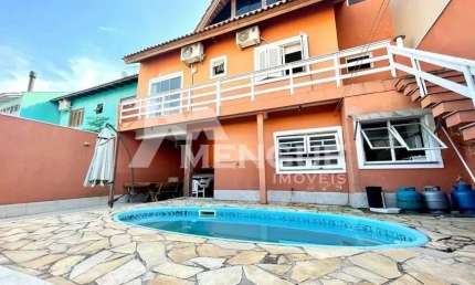 Casa com 4 quartos à venda na Rua Abaeté, 771, Sarandi, Porto Alegre por R$ 1.790.000