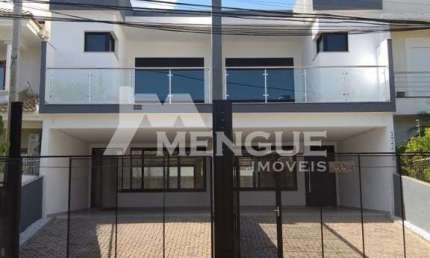 Casa com 3 quartos à venda na Rua Lagoa do Peixe, 95, Ecoville, Porto Alegre por R$ 980.000