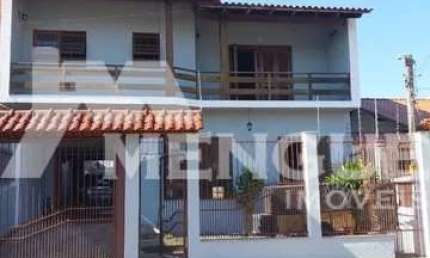 Casa com 4 quartos à venda na Rua Serafim Alencastro, 679, Sarandi, Porto Alegre por R$ 990.000