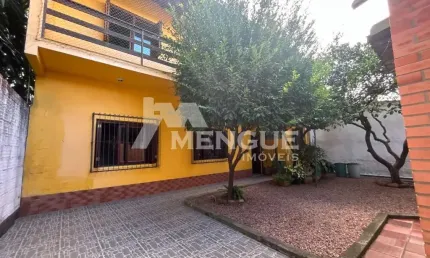 Casa com 4 quartos à venda na Avenida Teixeira Mendes, 328, Chácara das Pedras, Porto Alegre por R$ 850.000
