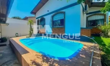 Casa com 3 quartos à venda na Rua Congo, 110, Vila Ipiranga, Porto Alegre por R$ 1.100.000