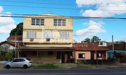 Casa com 3 quartos à venda na Rua Paul Harris, 750, Jardim Itu Sabará, Porto Alegre por R$ 650.000