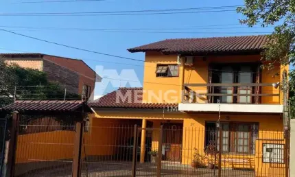 Casa com 3 quartos à venda na Rua Cacilda Yaconis Becker, 87, Rubem Berta, Porto Alegre por R$ 650.000