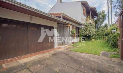 Casa com 4 quartos à venda na Rua Araponga, 233, Chácara das Pedras, Porto Alegre por R$ 990.000