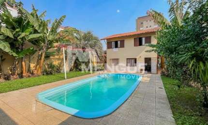 Casa com 4 quartos à venda na Rua Fernando Cortez, 476, Cristo Redentor, Porto Alegre por R$ 1.170.000