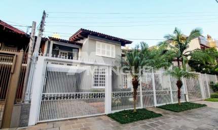 Casa com 4 quartos à venda na Rua Irmão Augusto, 100, Jardim Lindóia, Porto Alegre por R$ 1.600.000
