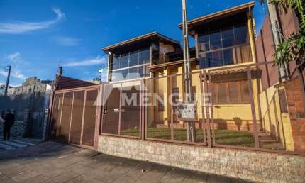 Casa com 4 quartos à venda na Rua Ricalde Marques, 205, Jardim São Pedro, Porto Alegre por R$ 1.090.000
