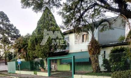 Casa com 5 quartos à venda na Rua Baden Powell, 315, Sarandi, Porto Alegre por R$ 880.000