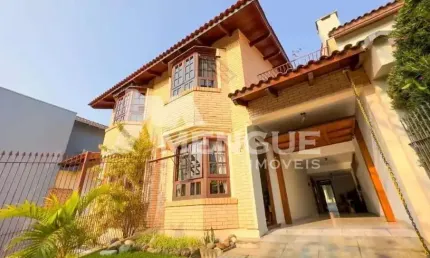 Casa com 3 quartos à venda na Rua Walir Zottis, 540, Jardim Planalto, Porto Alegre por R$ 750.000