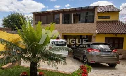 Casa com 3 quartos à venda na Rua Coronel José Rodrigues Sobral, 584, Partenon, Porto Alegre por R$ 2.100.000