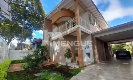 Casa com 3 quartos à venda na Rua Engenheiro Frederico Dahne, 525, Sarandi, Porto Alegre por R$ 790.000