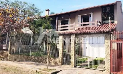 Casa com 4 quartos à venda na Rua Doutor Ricardo Gavenski, 235, Sarandi, Porto Alegre por R$ 990.000