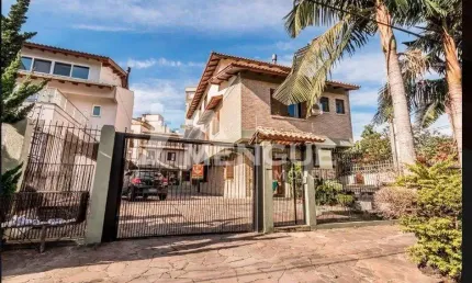 Casa em condomínio fechado com 3 quartos à venda na Avenida Karl Iwers, 252, Jardim Itu Sabará, Porto Alegre por R$ 638.300