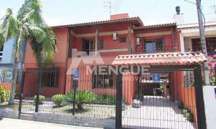 Casa com 4 quartos à venda na Rua Dom Jaime de Barros Câmara, 276, Sarandi, Porto Alegre por R$ 980.000