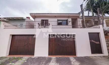 Casa com 3 quartos à venda na Rua Arnaldo Ballve, 695, Jardim Itu Sabará, Porto Alegre por R$ 520.000