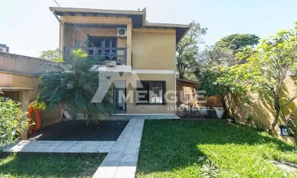 Casa com 3 quartos à venda na Rua Eugênio Du Pasquier, 283, Cristo Redentor, Porto Alegre por R$ 890.000