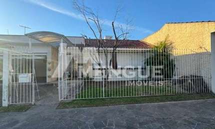 Casa com 3 quartos à venda na Travessa Alasca, 98, Jardim Lindóia, Porto Alegre por R$ 890.000