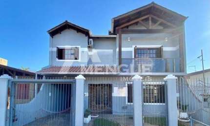 Casa com 4 quartos à venda na Rua Corrêa de Mello, 1060, Sarandi, Porto Alegre por R$ 795.000