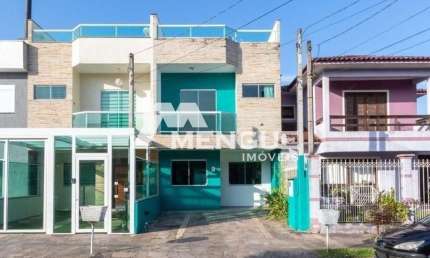 Casa em condomínio fechado com 3 quartos à venda na Rua Angico, 114, Hípica, Porto Alegre por R$ 619.000