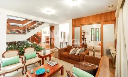Casa com 3 quartos à venda na rua eudoro berlink, 987, auxiliadora, porto alegre por r$ 1.990.000