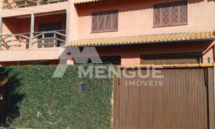 Casa com 7 quartos à venda na Rua Tuparaí, 21, Passo da Areia, Porto Alegre por R$ 1.450.000